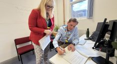 Sue and Simon sign the MOU
